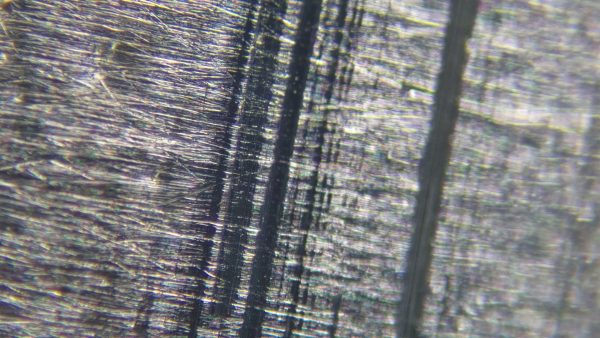 Proporcionális szelep kopása mikroszkóp alatt